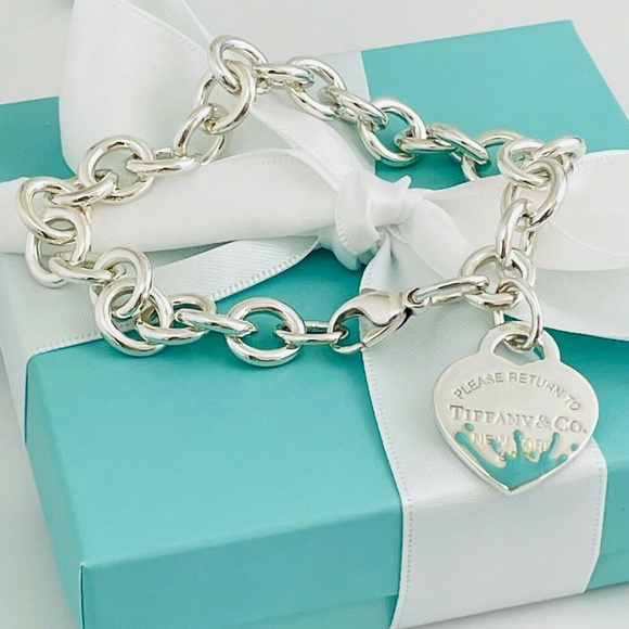 Tiffany & Co. Jewelry - RARE! Tiffany & Co Silver Heart Bracelet with the Iconic Robin's Egg Blue Splash